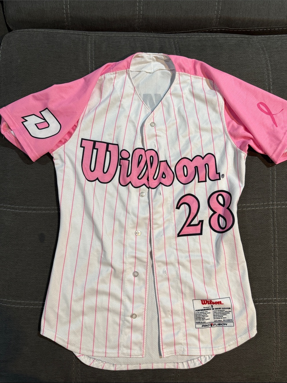 Wilson White & Pink Kids Baseball Jersey with Number 28